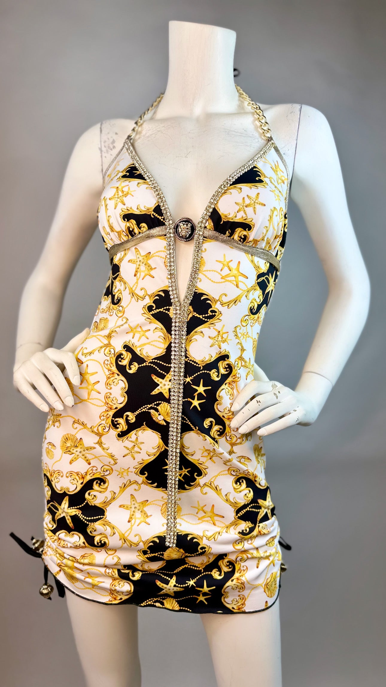 Halter open back short dress with medallion